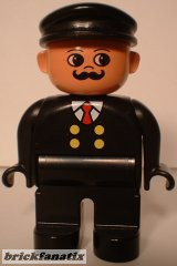 Lego Duplo Figure, Male, Black Legs, Black Top with 4 Yellow Buttons and Red Tie, Black Hat, Curly Moustache (Train Engineer)