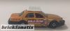 Matchbox 2006 Ford Crown Victoria - Gold Rusb TAXI